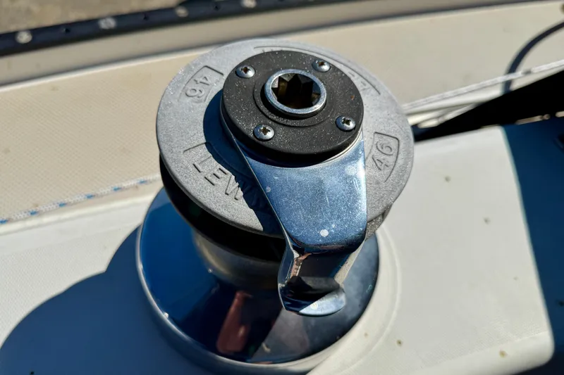 Winch on 1988 Catalina 34 sailboat deck, close-up view.