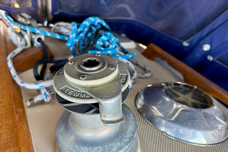 Winch and ropes on a 1988 Catalina 34 sailboat deck.