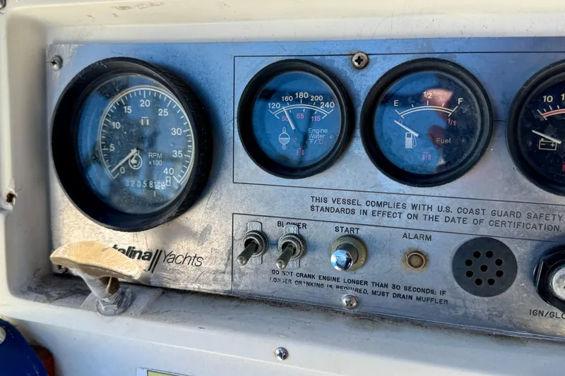 Dashboard of a 1988 Catalina 34 yacht with gauges and controls.