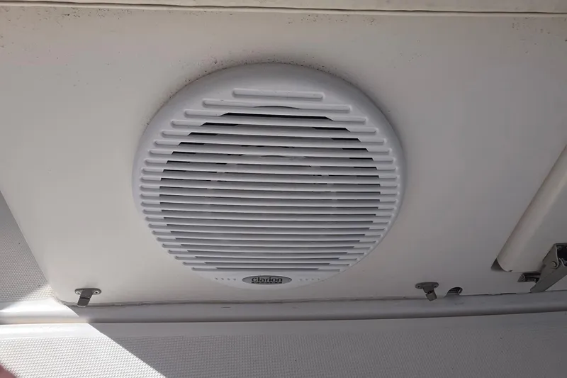 Clarion speaker installed on a 2004 Tiara Yachts 4000 Express ceiling.