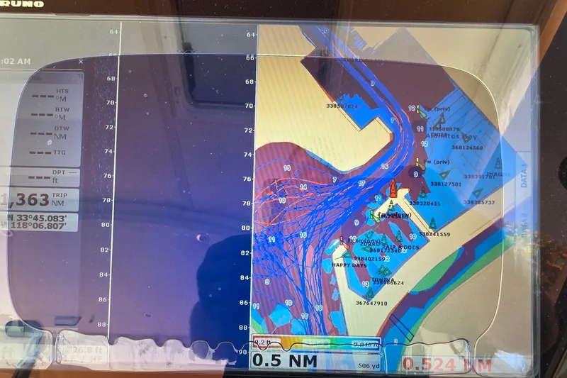 Navigation display on a 2004 Tiara Yachts 4000 Express, showing nautical chart and coordinates.