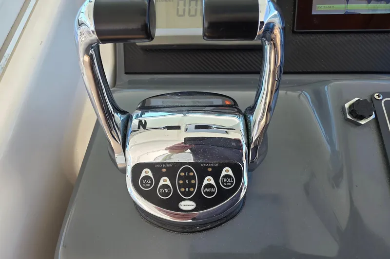 Throttle controls on a 2004 Tiara Yachts 4000 Express boat dashboard.
