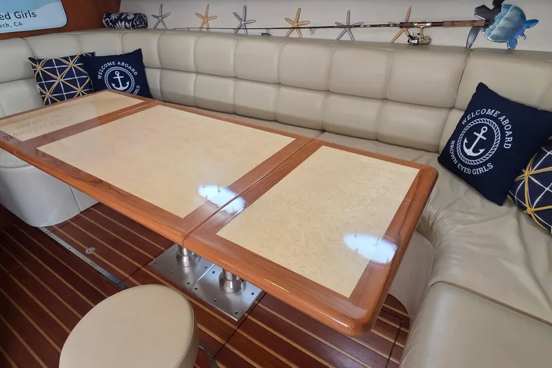 Luxurious interior of 2004 Tiara Yachts 4000 Express with elegant seating and nautical decor.