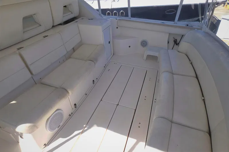 2004 Tiara Yachts 4000 Express interior with white seating and spacious layout.