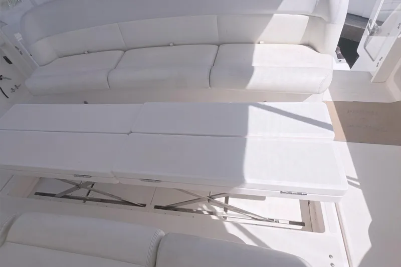 2004 Tiara Yachts 4000 Express interior seating area with convertible table.