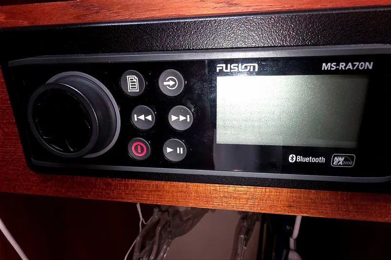 Fusion MS-RA70N stereo system on 2004 Tiara Yachts 4000 Express, featuring Bluetooth connectivity.