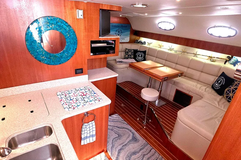 Luxurious 2004 Tiara Yachts 4000 Express interior with elegant seating and modern amenities.