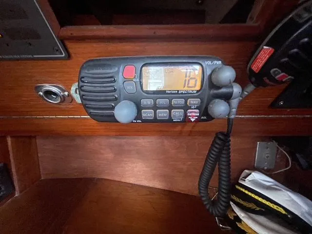 VHF marine radio on 1981 Endeavour 43 Center Cockpit Ketch, channel 16 displayed.
