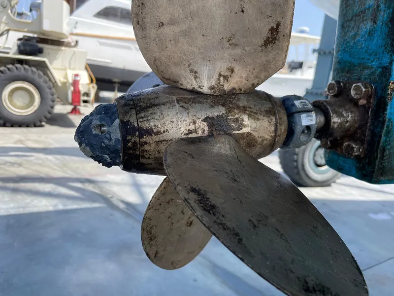 Propeller of 1981 Endeavour 43 Center Cockpit Ketch in a boatyard setting.