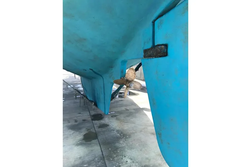 Bottom view of 1981 Endeavour 43 Center Cockpit Ketch with visible propeller and rudder.