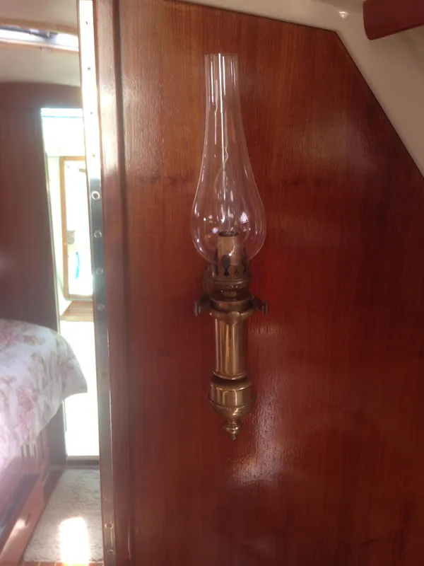 Antique brass gimballed sconce lights