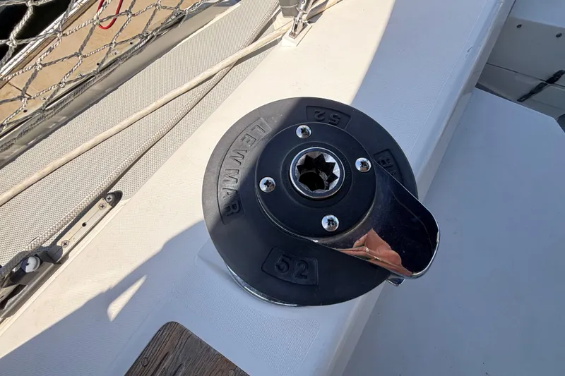 Winch on 1990 Catalina 42 sailboat deck, featuring Lewmar brand.