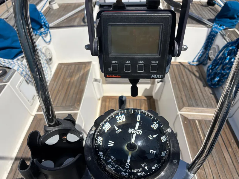 Cockpit view of 1994 Nautor Swan 46 MK II sailboat with compass and navigation instruments.