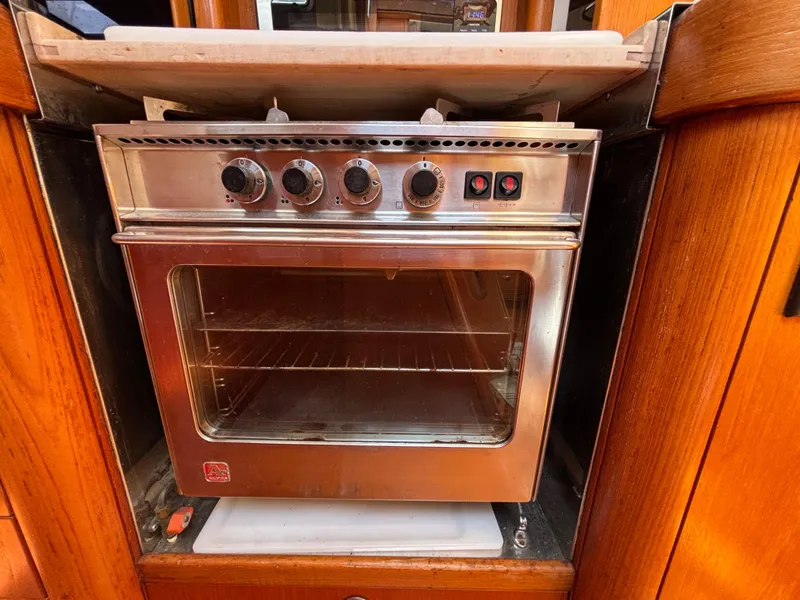 Stainless steel oven in a 1994 Nautor Swan 46 MK II yacht kitchen.