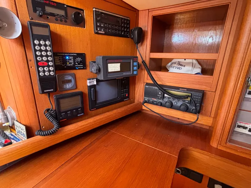 Navigation equipment on a 1994 Nautor Swan 46 MK II yacht, featuring communication devices and controls.