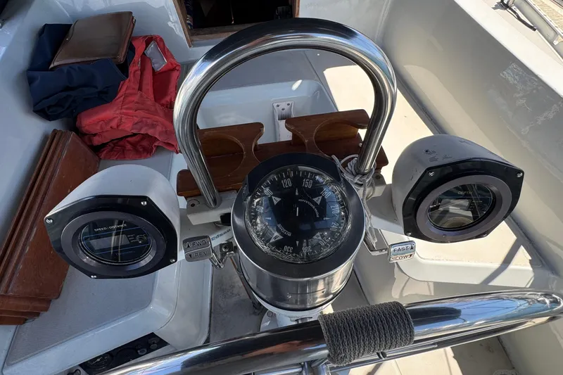 1989 Ericson Sloop cockpit with compass and navigation instruments.
