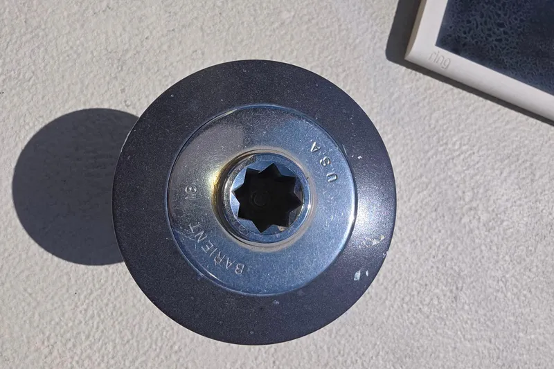Winch handle socket on 1978 Islander Freeport 41 sailboat deck.