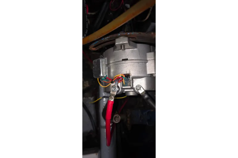 Close-up of wiring on a 1978 Islander Freeport 41 engine component.