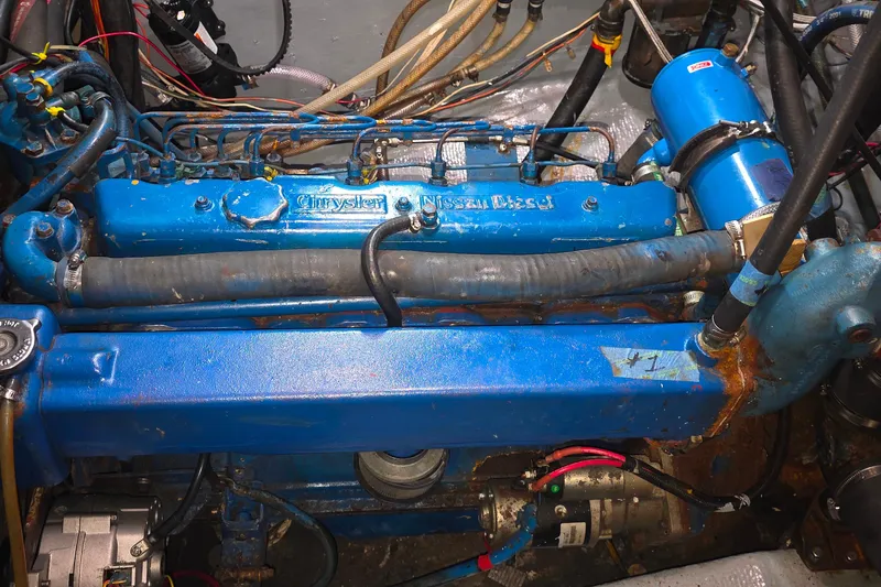 Engine compartment of a 1978 Islander Freeport 41 sailboat with Chrysler Nissan Diesel engine.