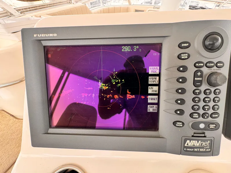 Furuno navigation system on 2004 Riviera 47 Flybridge yacht displaying radar screen.