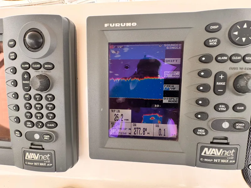 Navigation equipment on a 2004 Riviera 47 Flybridge, featuring Furuno and NAVnet displays.