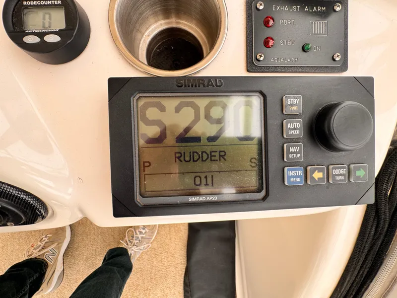 Simrad autopilot display on 2004 Riviera 47 Flybridge boat dashboard.