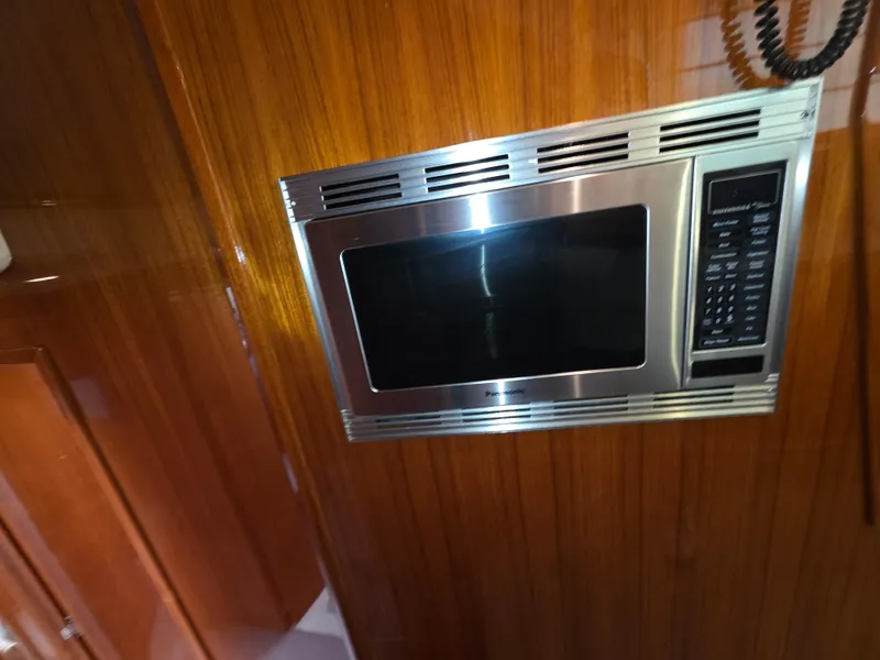 Built-in microwave in 2004 Riviera 47 Flybridge yacht kitchen.
