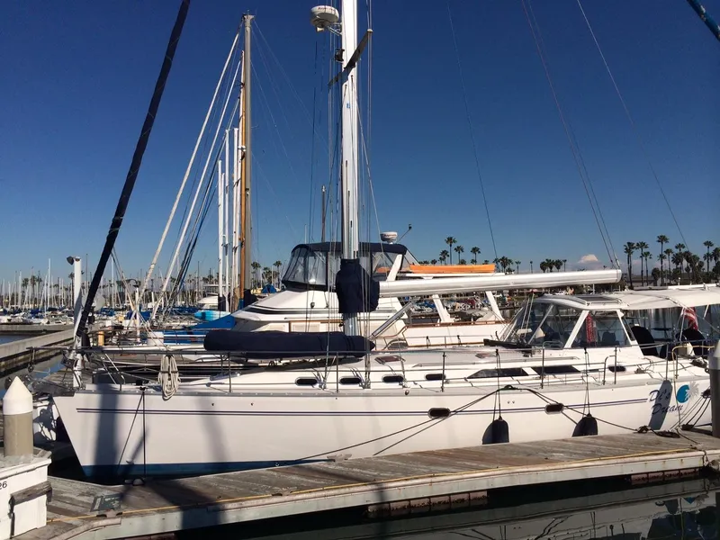 Dock view of boat with dingy