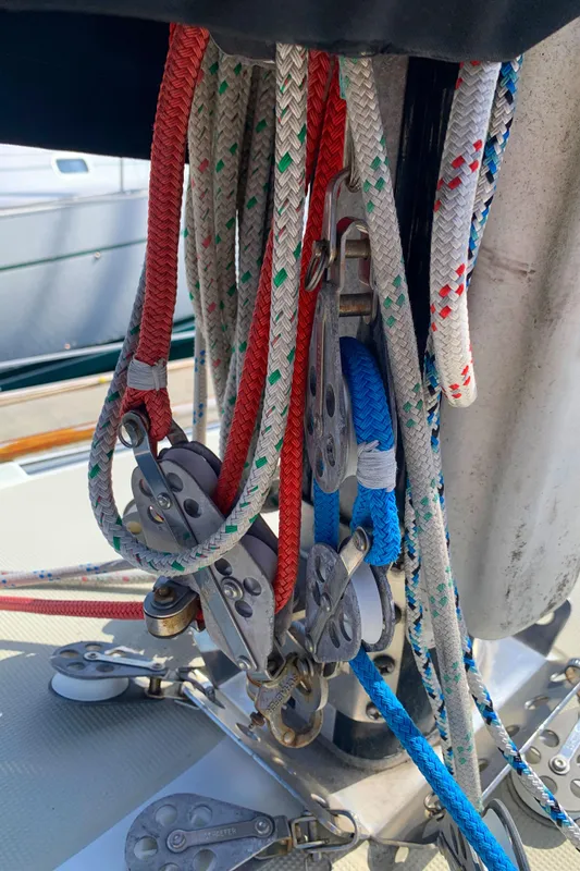 Colorful ropes and pulleys on a 1984 Ericson 30 Plus sailboat.