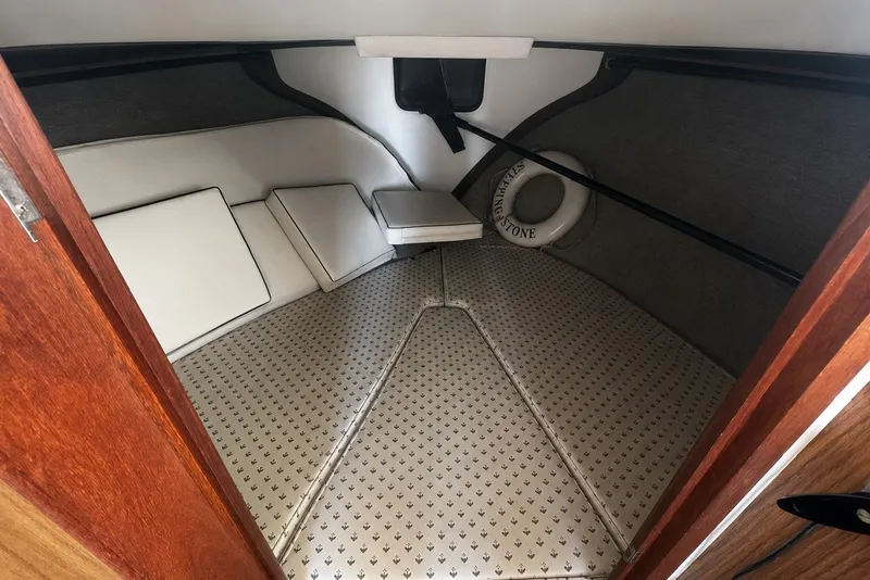 1972 Luhrs 32 Convertible boat interior with cushioned seating and life preserver.