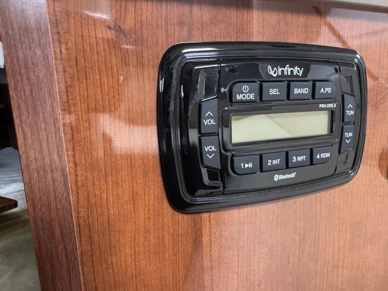 Infinity stereo system on 2016 Four Winns 255 Vista boat dashboard.
