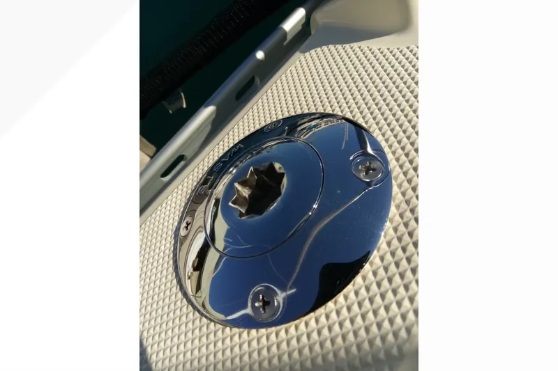 Close-up of a polished metal fitting on a 2002 Pacific Seacraft Dana 24 sailboat.