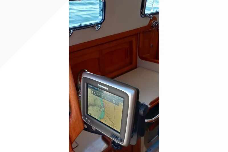 Navigation system inside a 2002 Pacific Seacraft Dana 24 sailboat cabin.