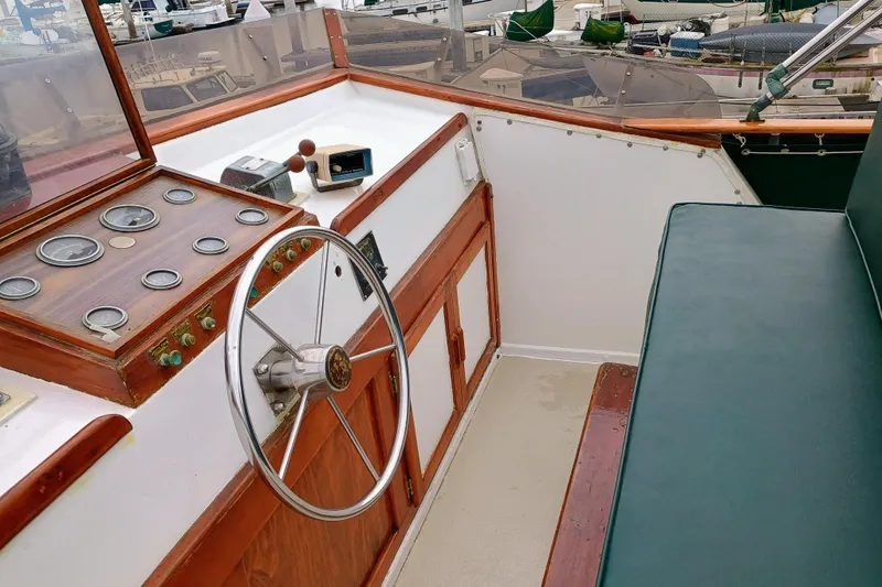 1978 Californian LRC boat helm with vintage controls and steering wheel.
