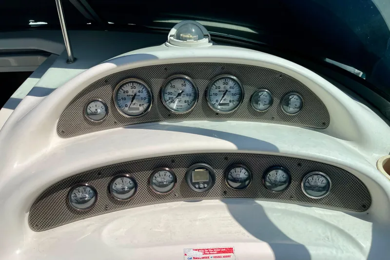 Dashboard of a 2000 Monterey 302 Cruiser with multiple gauges and controls.