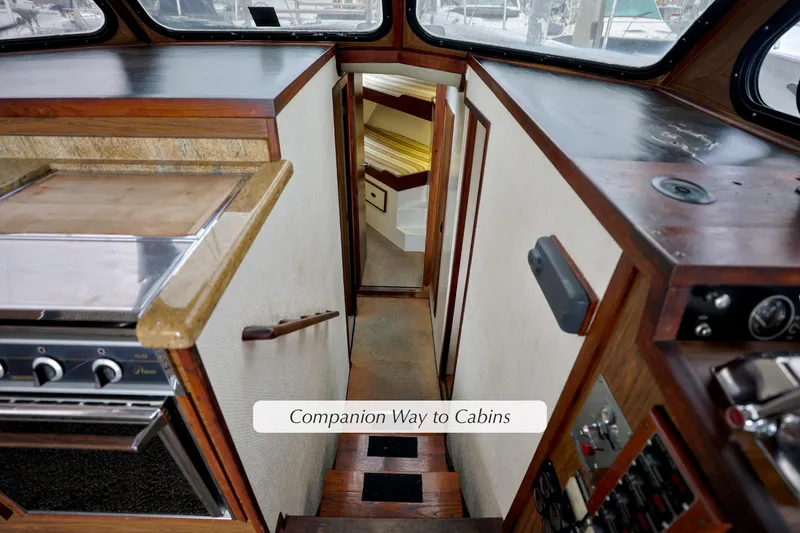 Companionway to cabins on 1980 Pacifica 41 Sportfisher boat interior.