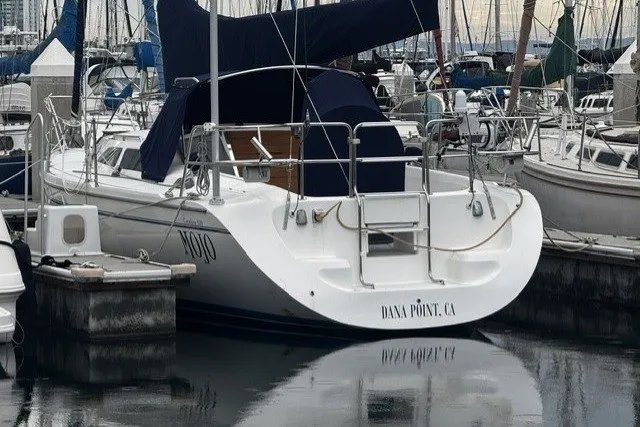 Catalina 320 sailboat, 2000 model, docked at Dana Point marina.