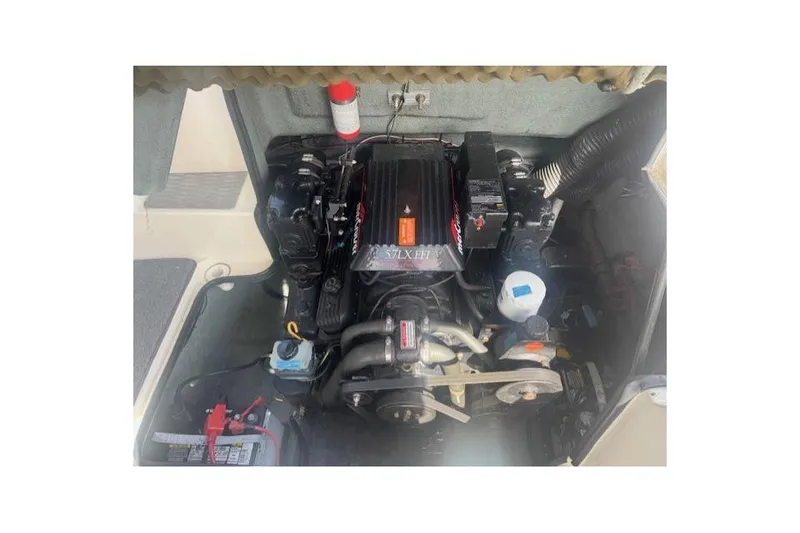 Engine compartment of a 1997 Sea Ray 240 Sundeck boat.
