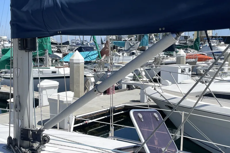 Catalina 350 sailboat from 2004 docked at a marina with other boats.