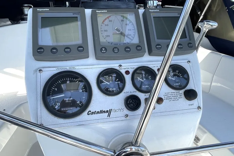 Control panel of a 2004 Catalina 350 yacht with navigation instruments.