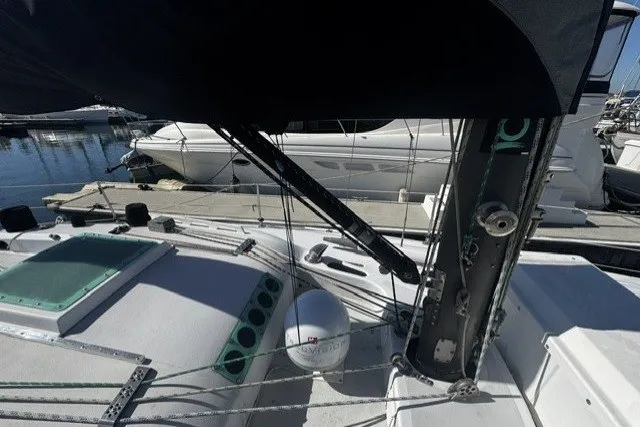 Sailboat deck view of 1973 Custom BILL LEE 40, docked at marina.