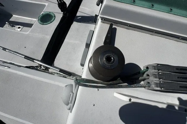 Deck of 1973 Custom BILL LEE 40 sailboat with winch and rigging details.