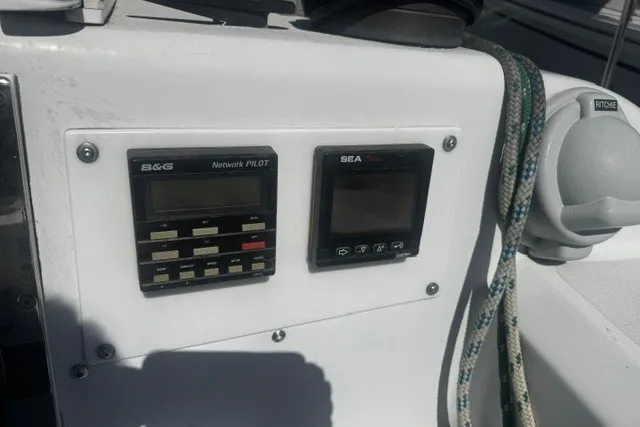 Control panel of 1973 Custom BILL LEE 40 sailboat with navigation instruments.