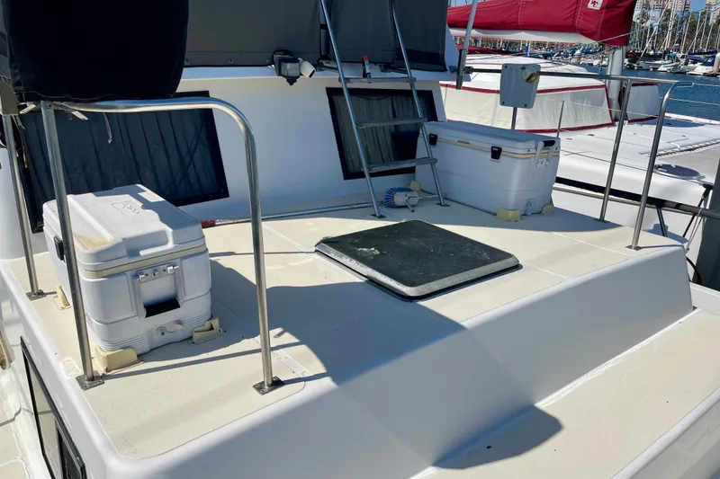 1985 CHB 42 yacht deck with coolers and marina view.