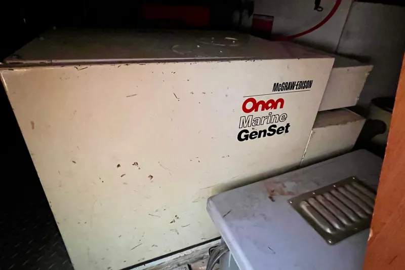 Onan Marine GenSet generator inside a 1985 CHB 42 boat engine room.