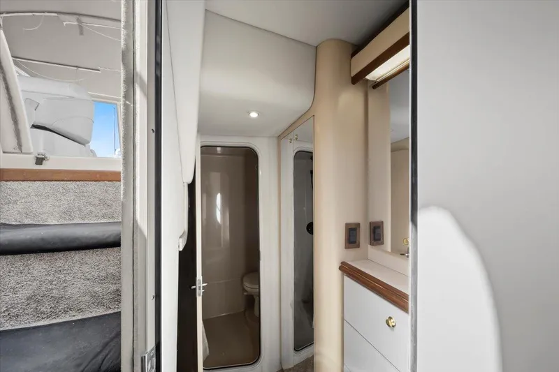 1999 Cruisers Yachts 3870 Esprit interior with bathroom and stairs.