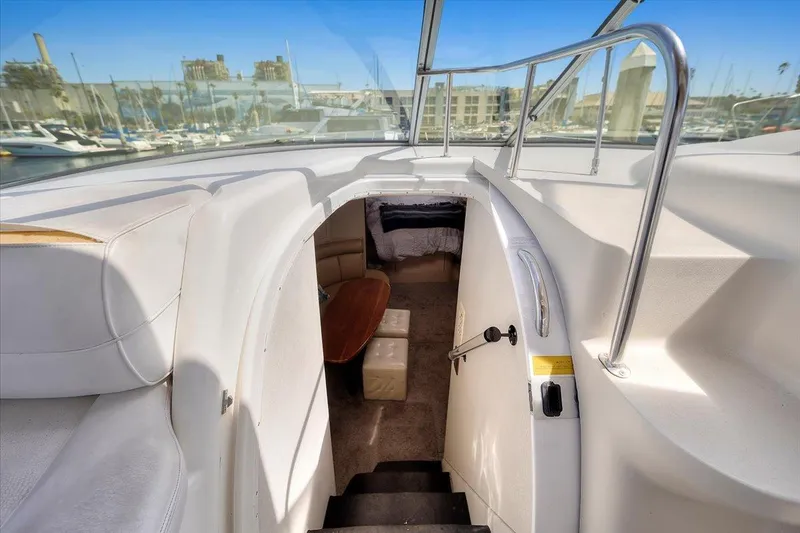 1999 Cruisers Yachts 3870 Esprit interior view with stairs leading to cabin.