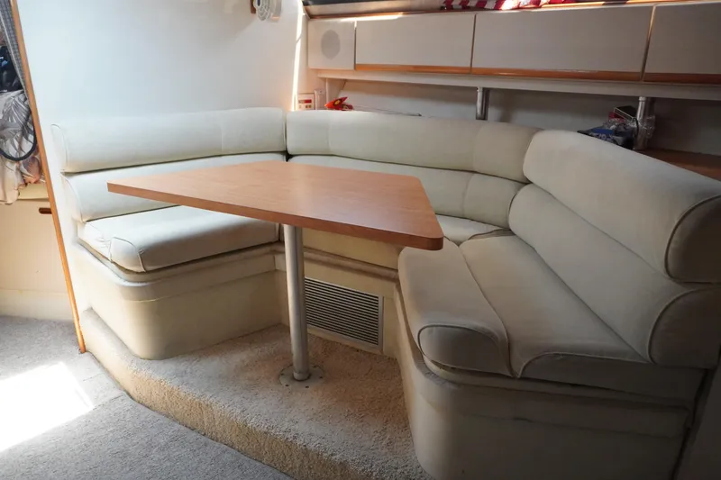 Interior of a 1996 Wellcraft 3200 Martinique yacht with seating area.