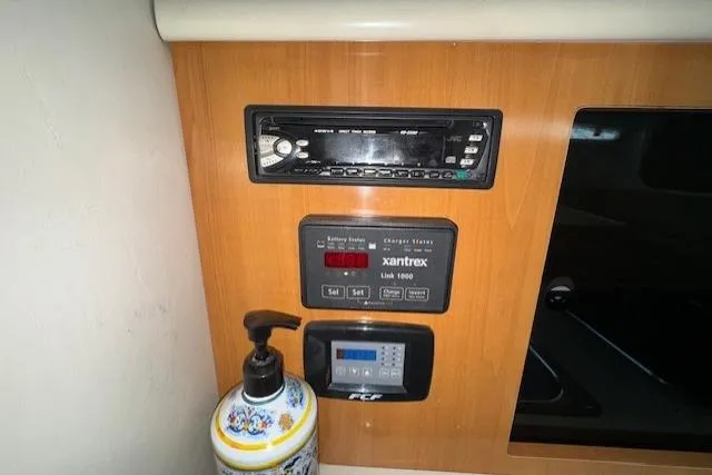 Control panel of a 2001 Bayliner 2855 Ciera boat with electronic displays.