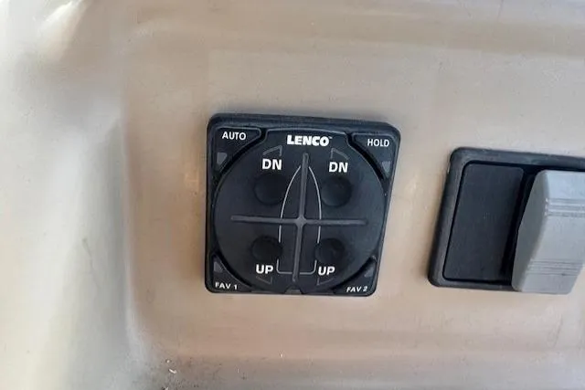 Lenco trim tab control panel on 2001 Bayliner 2855 Ciera boat dashboard.